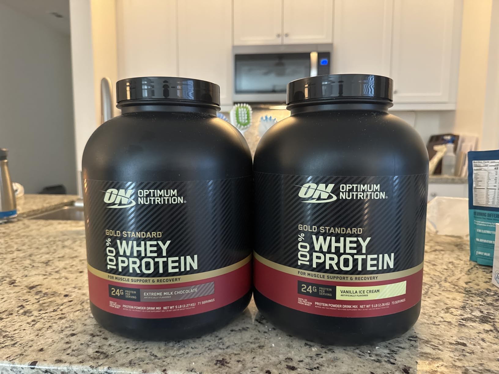 Optimum Nutrition Gold Standard 100% Whey Protein Powder, Extreme Milk Chocolate, 2 Pound (Pack of 1) (Packaging May Vary) customer photo 1