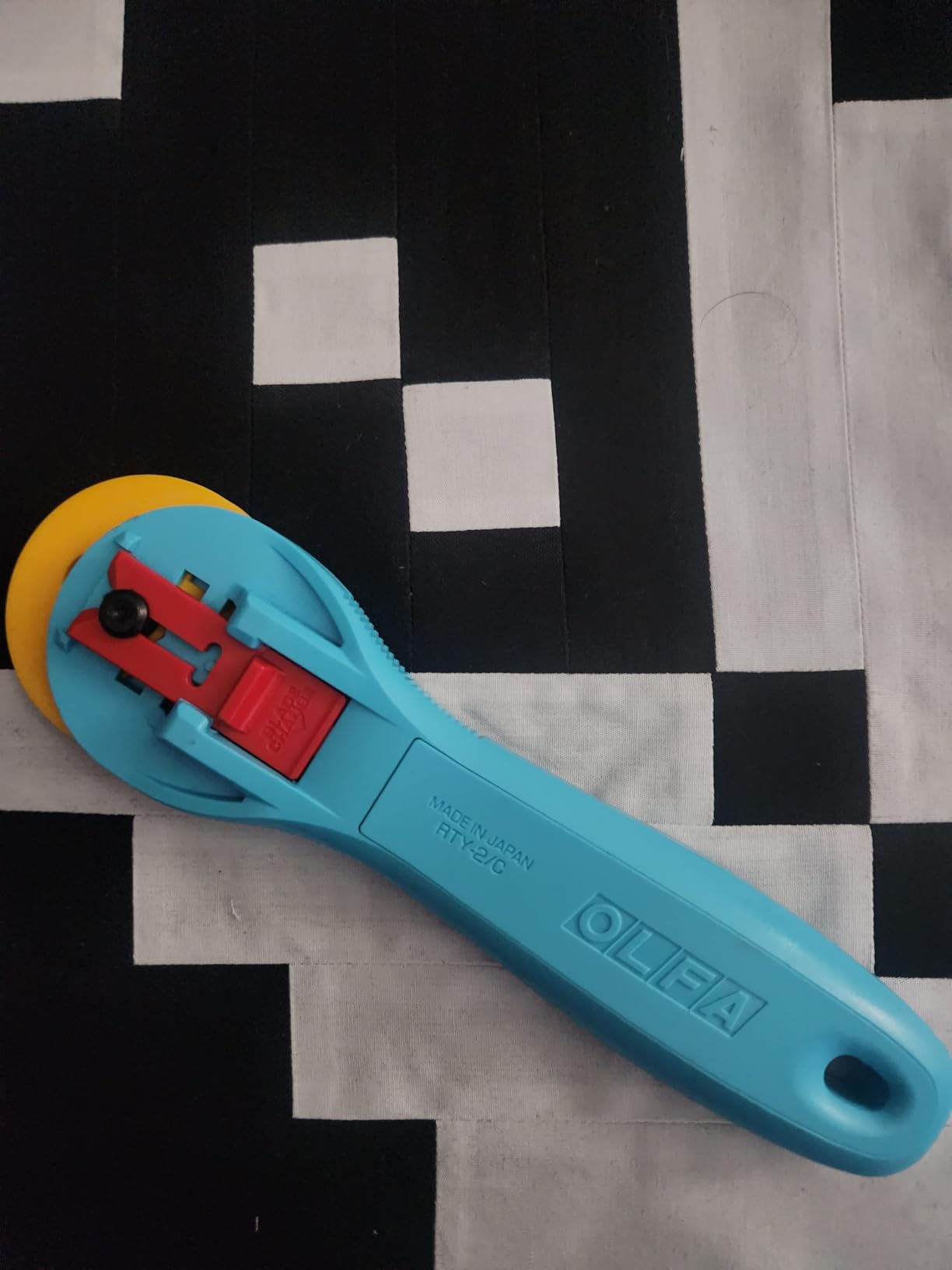 OLFA 45mm Quick-Change Rotary Cutter (RTY-2/C) - Rotary Fabric Cutter with Blade Cover for Crafts, Sewing, Quilting (Aqua) customer photo 1