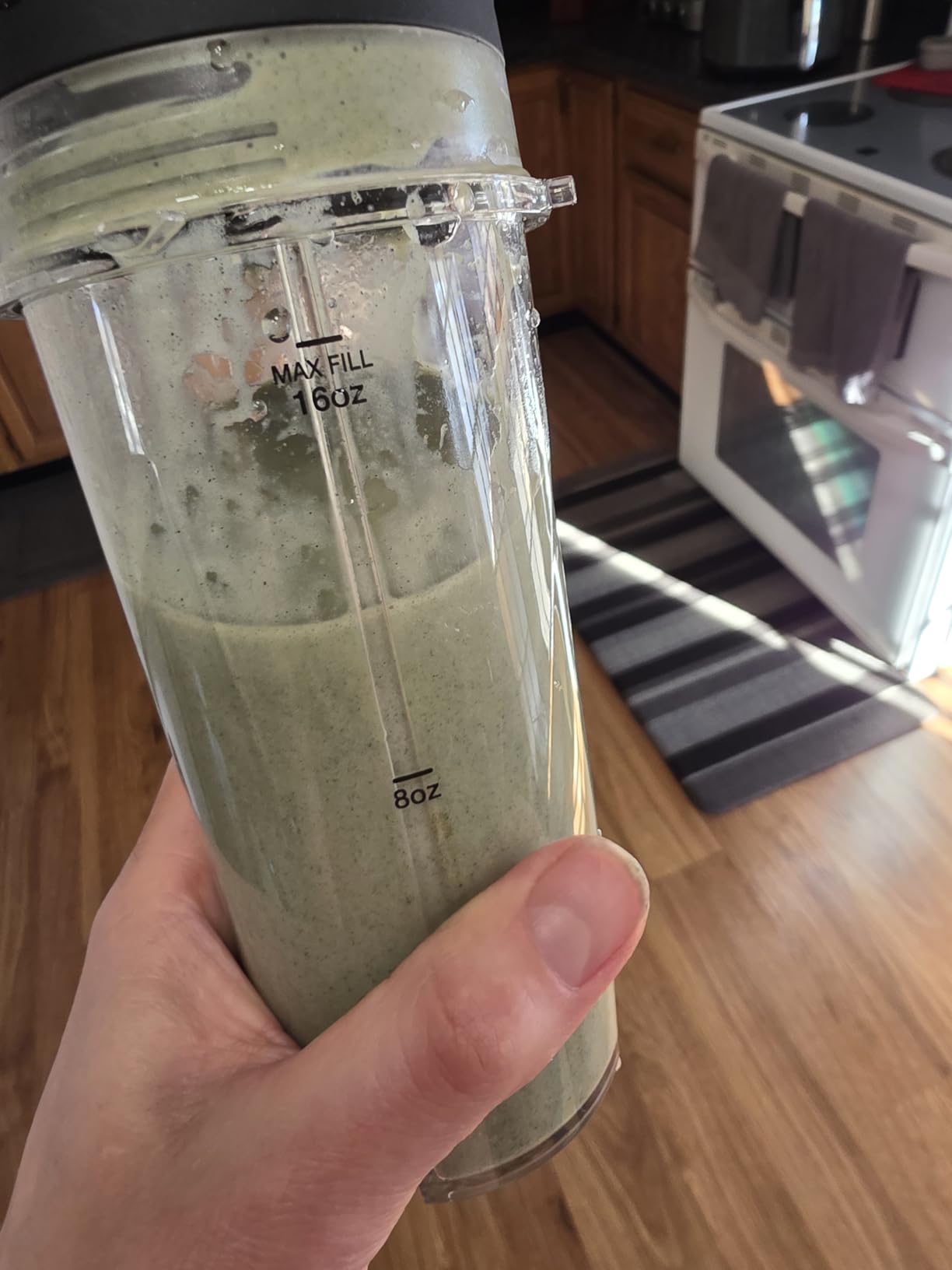 Ninja Fit Compact Personal Blender | For Smoothies, Shakes & Frozen Drinks | (2) 16-oz. To-Go Cups with Spout Lids | 700-Watt Countertop | Black | QB3001SS customer photo 2