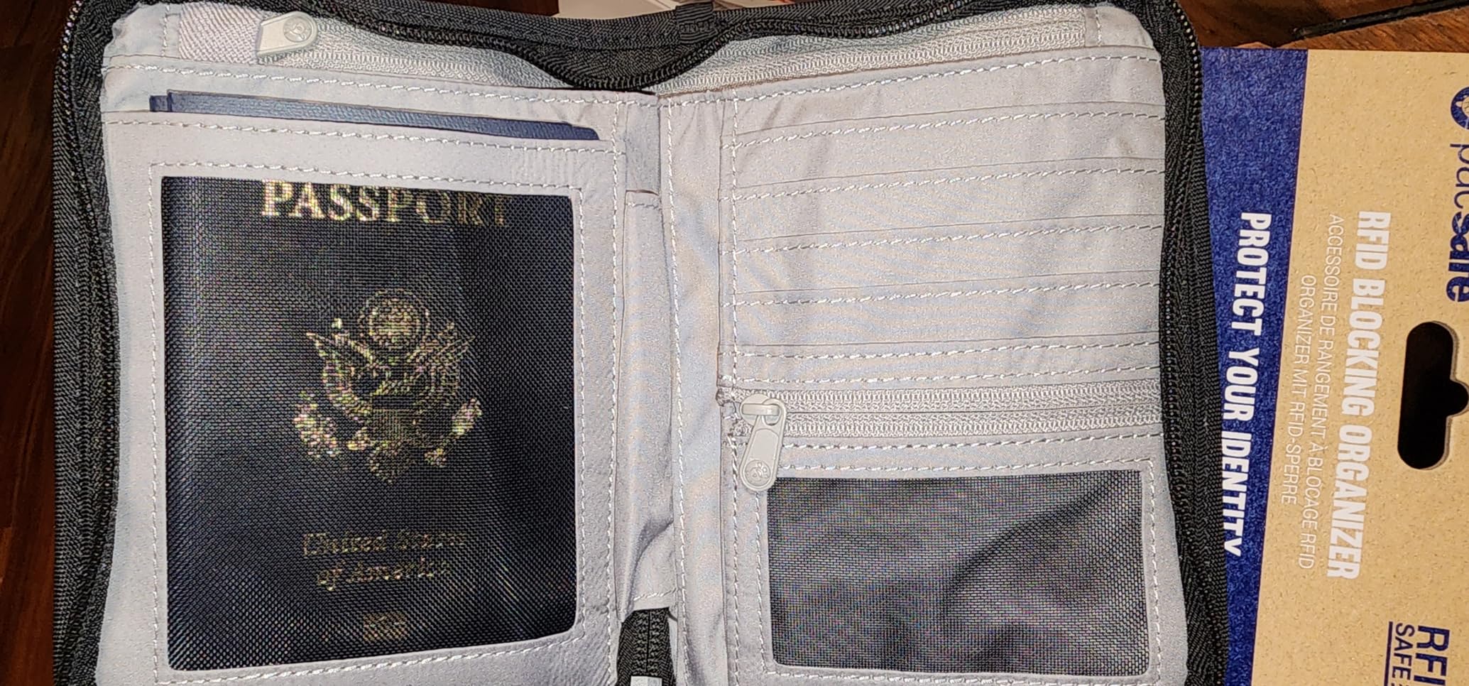 Pacsafe Rfidsafe V150 Anti-theft Blocking Compact Passport Wallet, Black customer photo 2