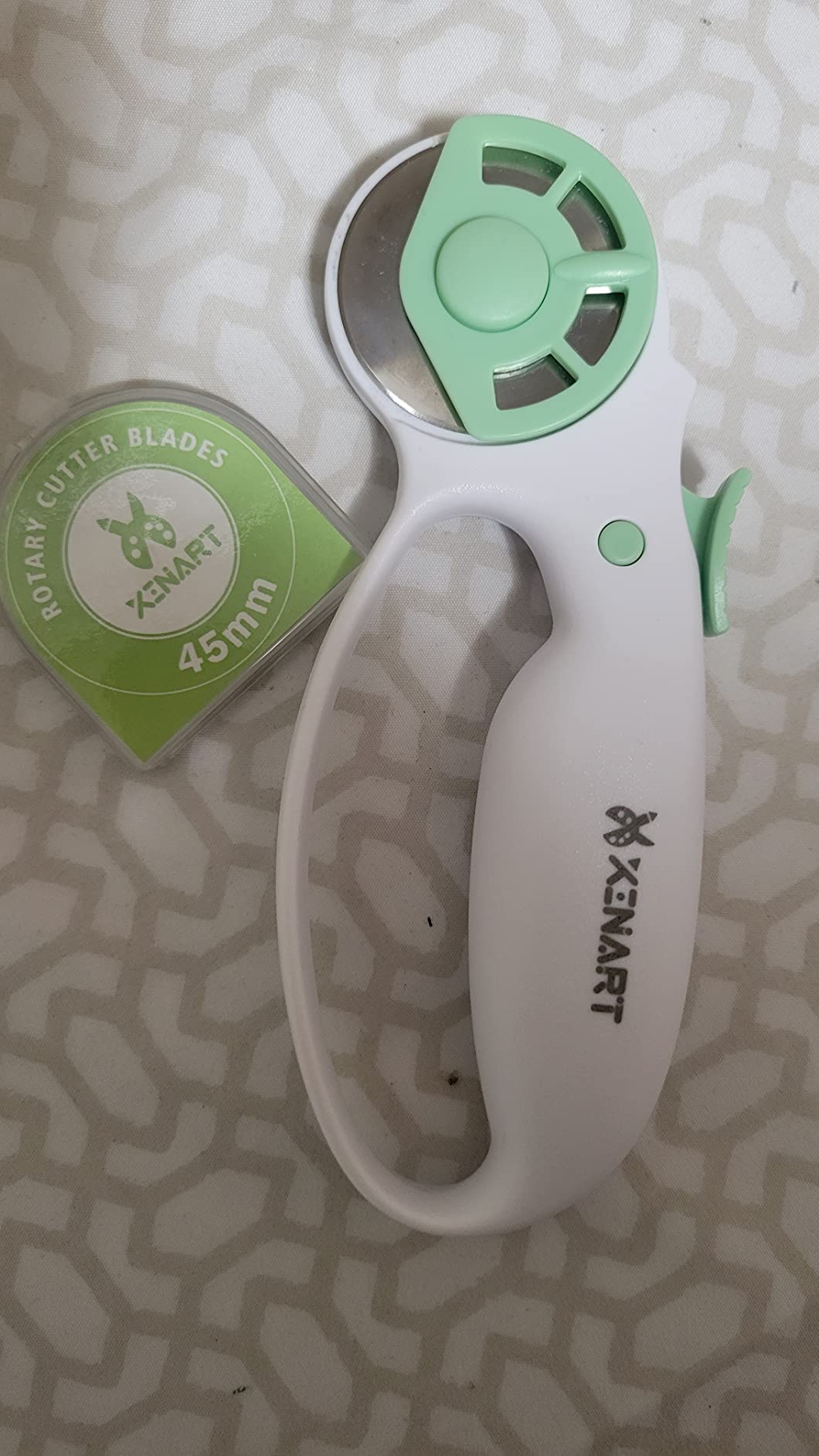 XINART 45mm Rotary Cutter for Fabric Safety Lock Ergonomic Classic Comfort Loop Fabric Small Rotary Cutter for Sewing Quilting Crafting (Extra 2pcs Replacement Blades Included) customer photo 1