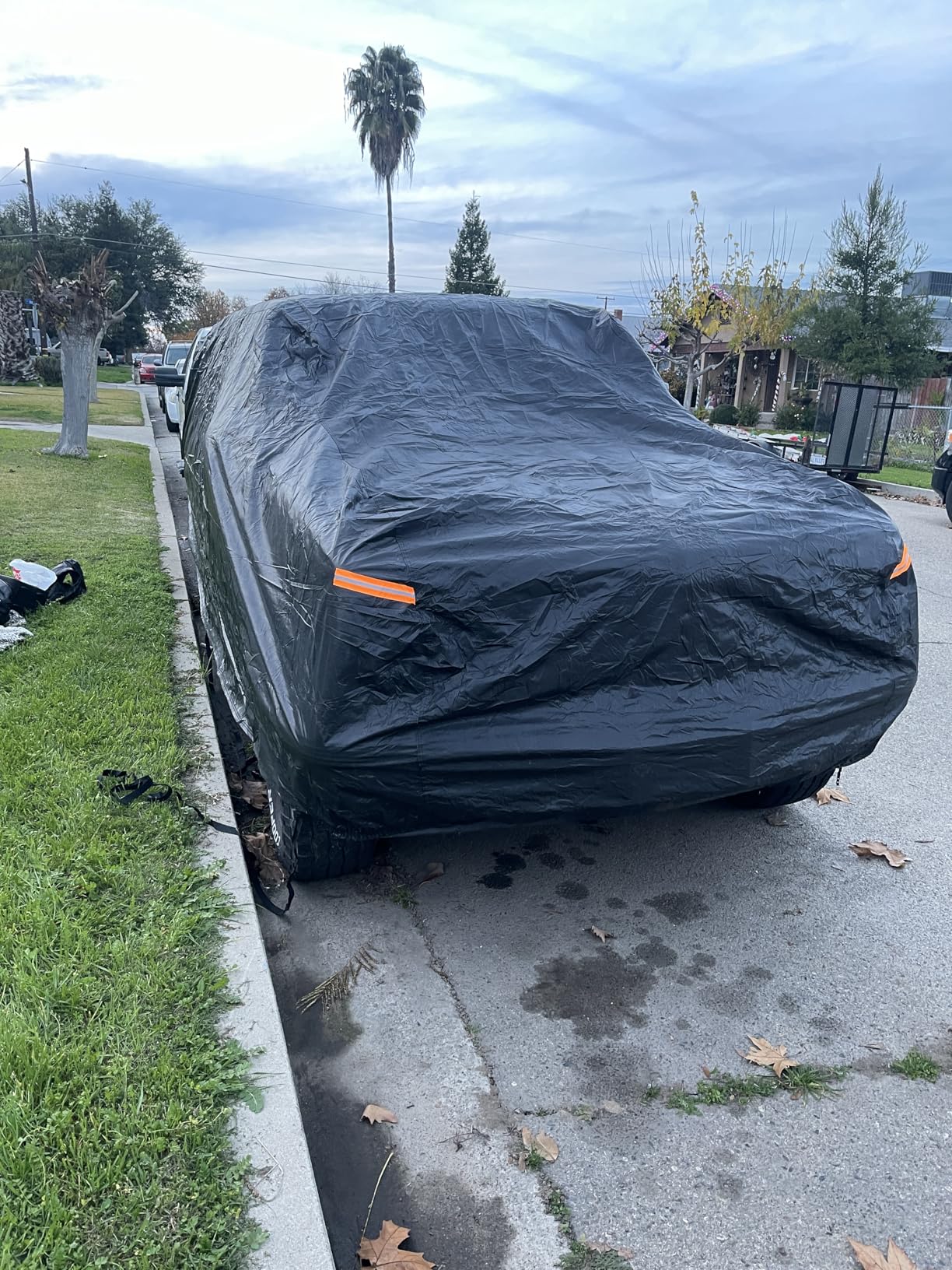 Kayme 7 Layers Heavy Duty Car Cover Waterproof All Weather Full Exterior Cover Outdoor Snow Sun Uv Protection with Zipper for Automobiles Universal Fit for Sedan 186 to 193 Inch customer photo 1