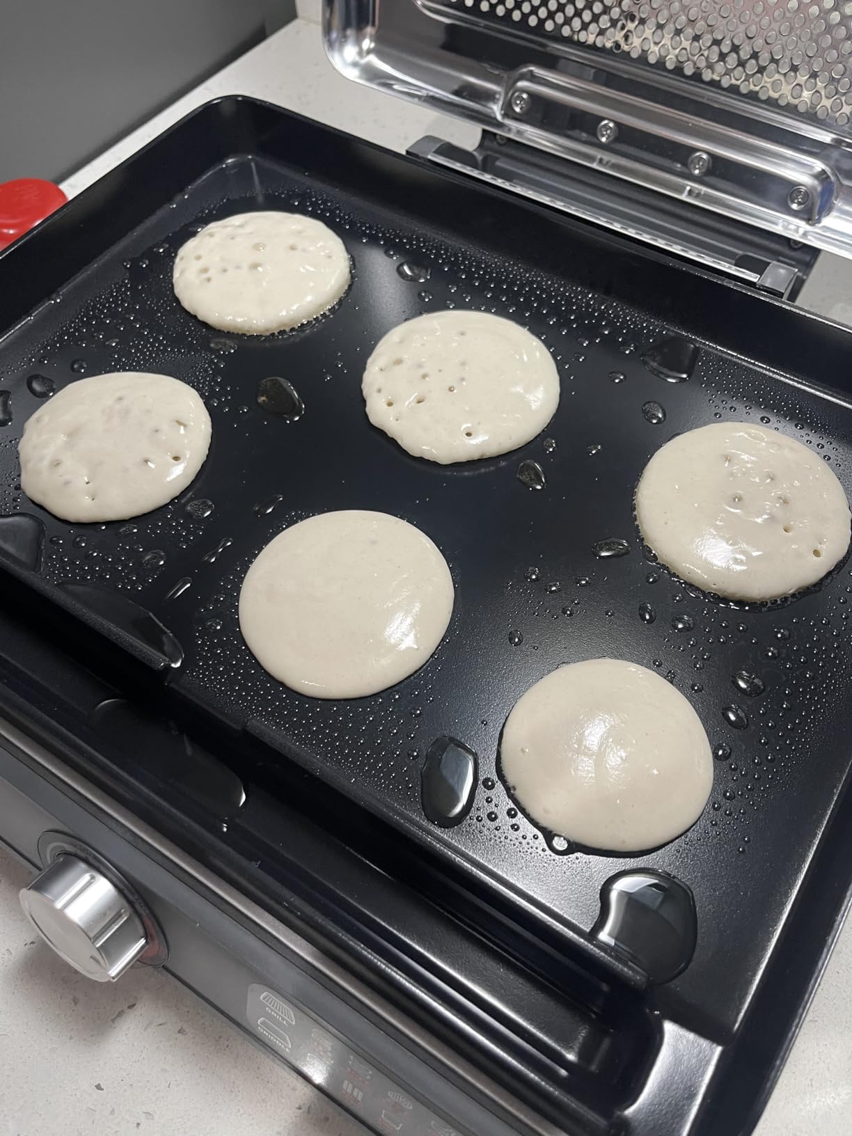 Ninja Griddle and Indoor Grill, 14'', Electric Grill, For Steak, Burgers, Salmon, Veggies, and More, Pancake Griddle, Nonstick, Dishwasher Safe, 500F, Even Cooking, Silver, GR101 customer photo 2