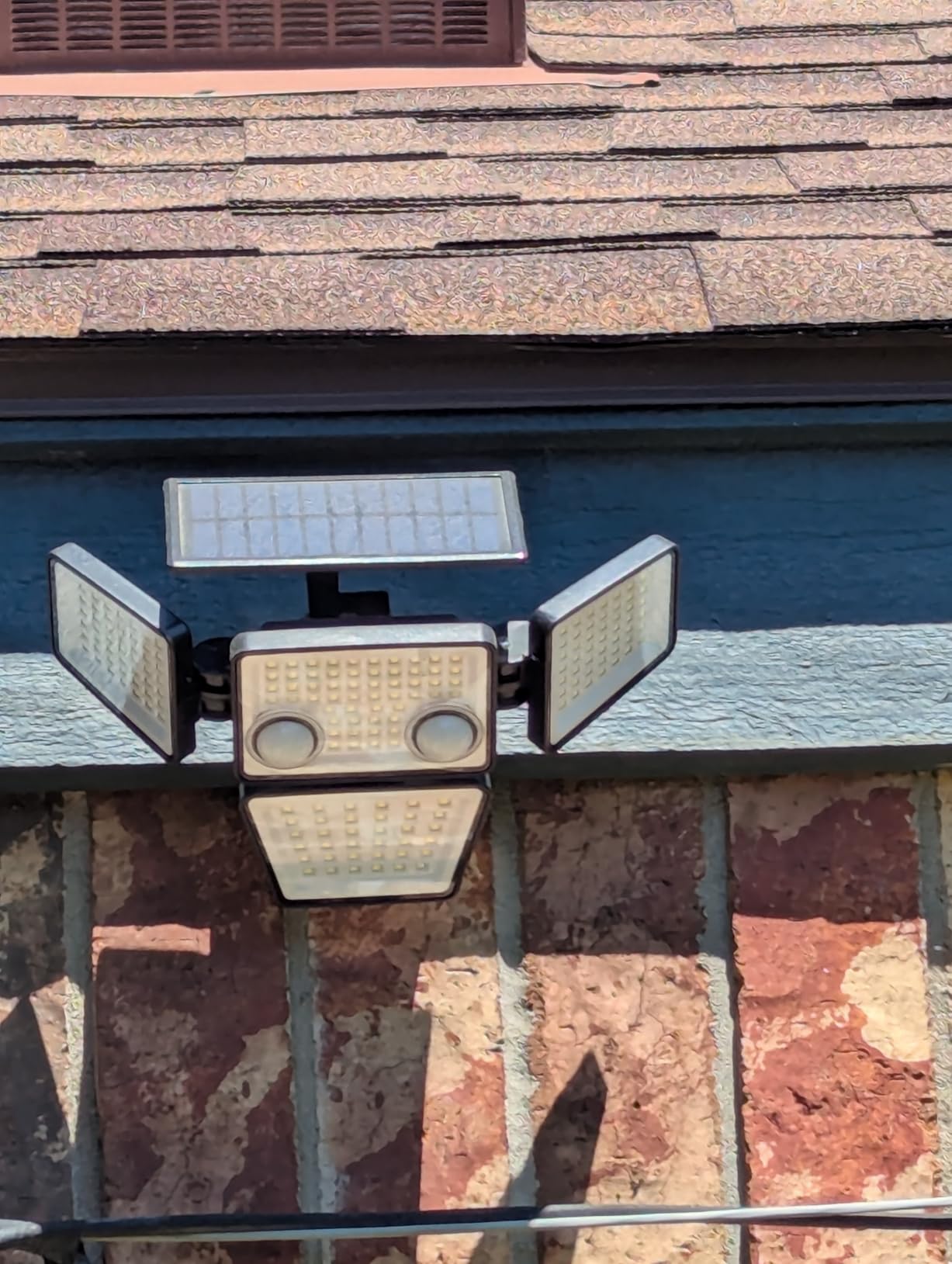 LYWALT Solar Outdoor Lights - 3000LM 188 LED Motion Sensor Outdoor Lights, 4 Heads Security Light,IP65 Waterproof, Easy Install,270°Wide Angle Flood Wall Light with 3 Modes for Backyard Yard (2 Pack) customer photo 1