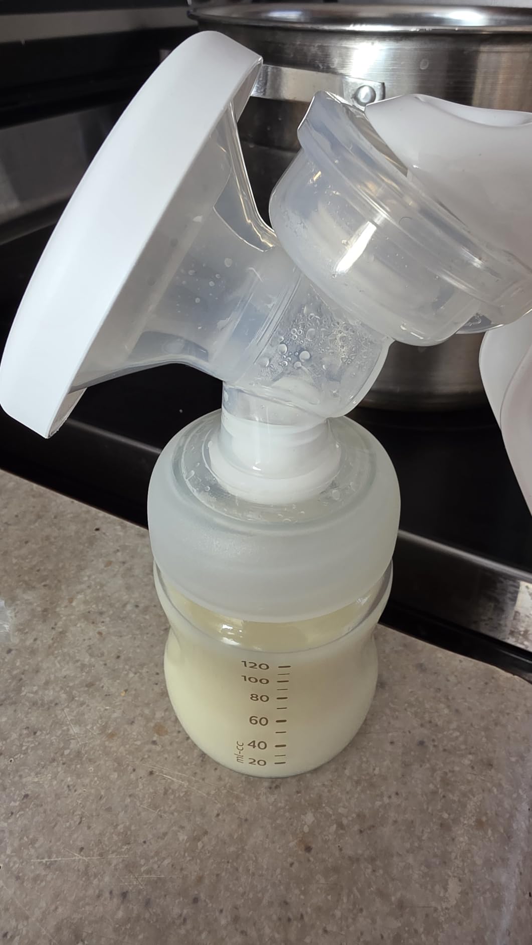 Philips Avent Manual Breast Pump, Easy Pumping with Natural Motion Technology, Silicone Cushion, 4oz Natural Bottle, Sealing Disc, Screw Ring, Transparent, Model SCF430/03 customer photo 1