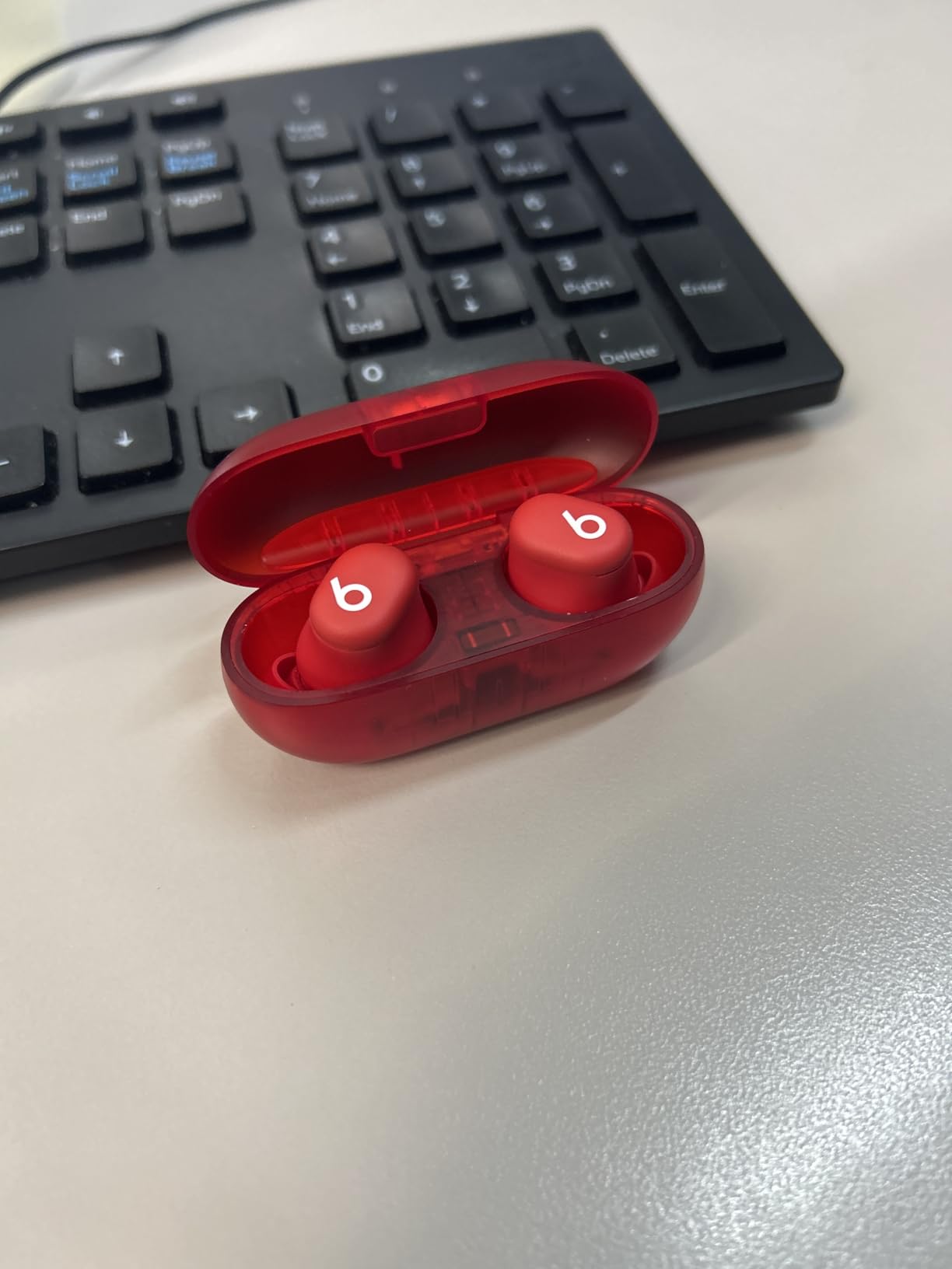 Beats Solo Buds - Wireless Bluetooth Earbuds | 18 Hours of Battery Life | Apple & Android Compatibility | Built-in Microphone - Transparent Red customer photo 1