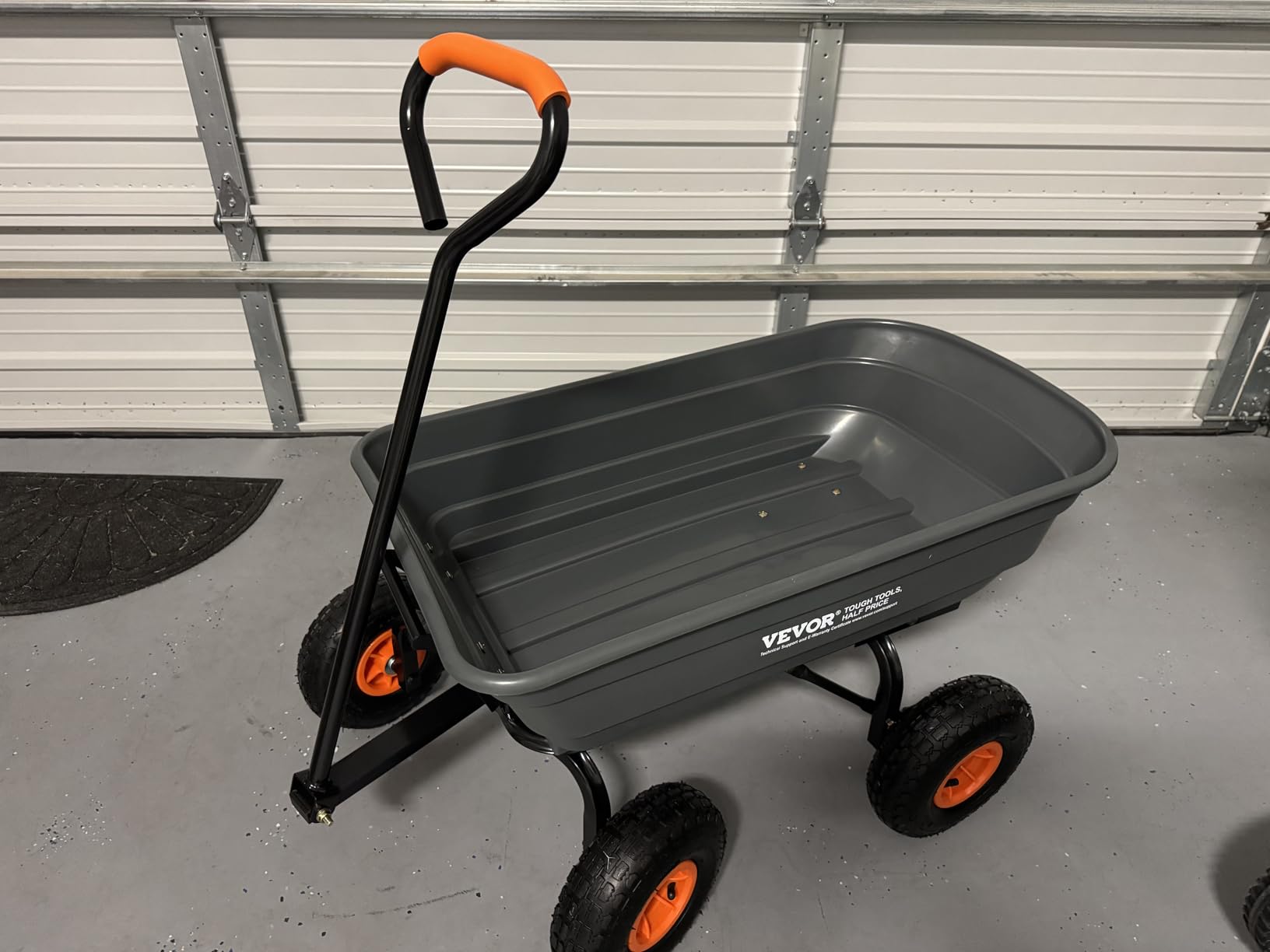VEVOR 4 Cu.Ft. 600lbs Poly Garden Dump Cart, Heavy Duty 4 Wheel Wheelbarrow Yard Cart Dump Wagon with 10in All Terrain Wheels, Steel Frame and Quick Release System customer photo 2