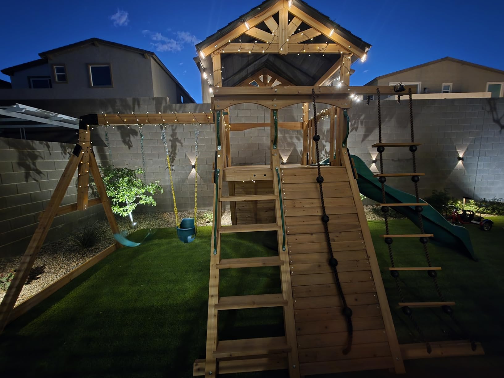 Backyard Discovery Endeavor Cedar Wood Swing Set with Wave Slide, Play Deck, Double Rock Wall, Rope Ladder, Climbing Wall, Belt Swings, 40-Inch Web Swing, Step Ladder, Toy Telescope, Outdoor Playset customer photo 2