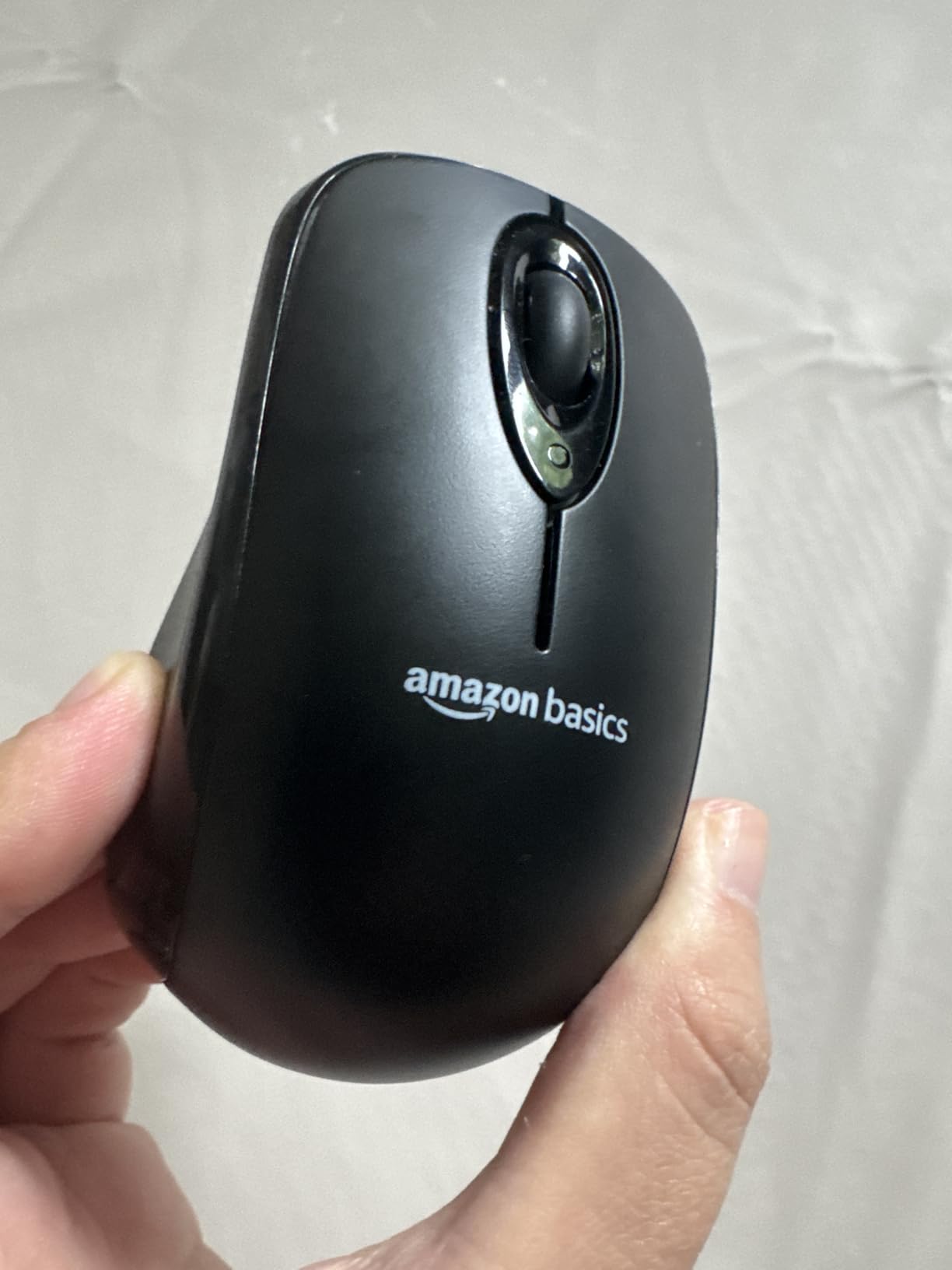 Amazon Basics 2.4 GHz Wireless Optical Computer Mouse with USB Nano Receiver, Portable, No Wires, Smooth Tracking, Multi-Device Compatibility, Black customer photo 2