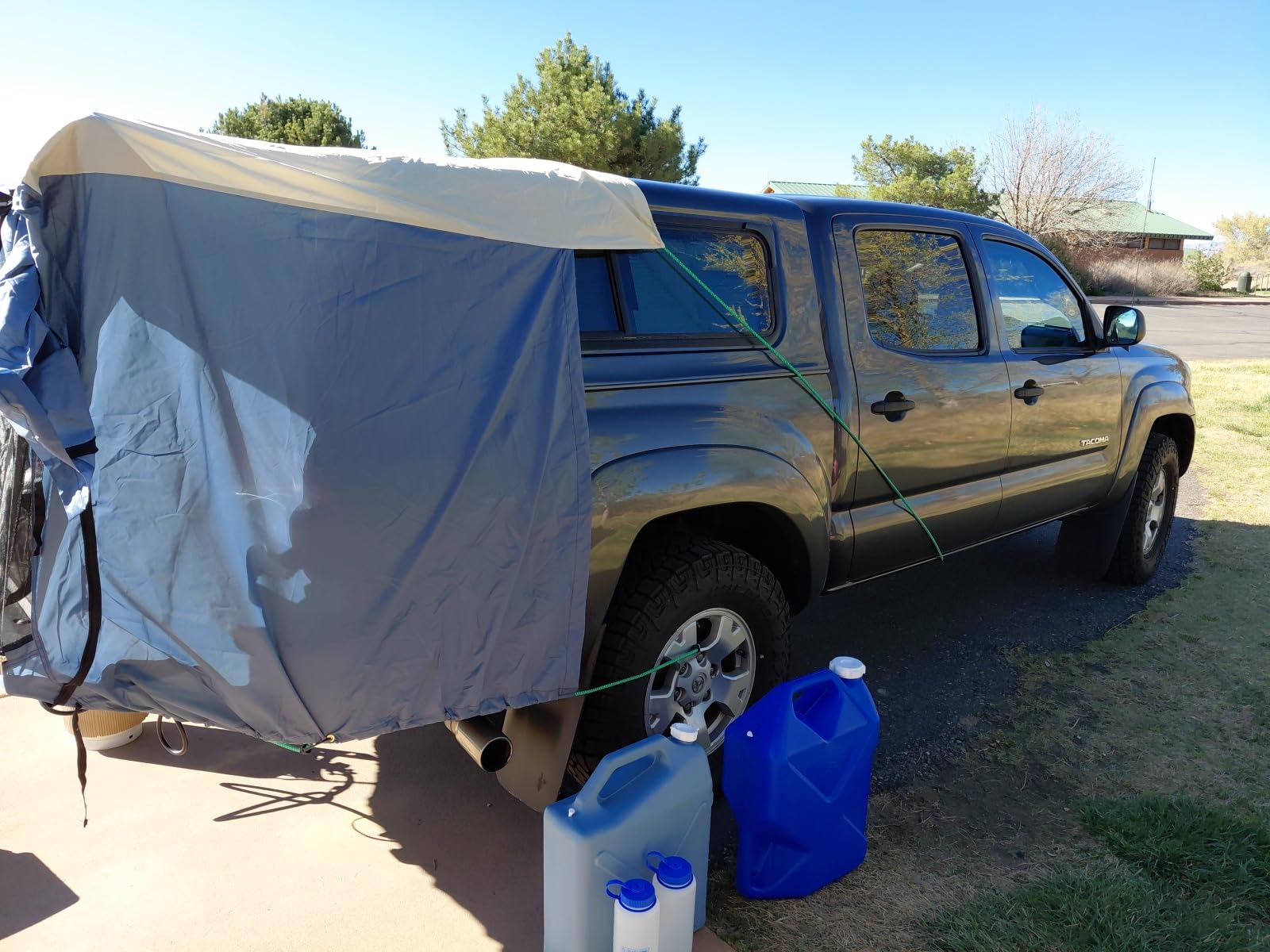 DAC Full-Size Truck Bed Tent for Caps - Fits Ford F-150, Chevy Silverado, Toyota Tundra, Tacoma (2005+), Tailgate >= 58″ – Converts Truck with Cap into Camping Tent customer photo 1″ class=”wp-image-customer”/></figure>


<p>The two-room design with ventilated mesh windows and roll-up door panels creates a comfortable living space that connects directly to your truck bed through the open cap window. It is rated as a 4-season tent, though I would be cautious about using it in serious winter conditions given its water-resistant rather than waterproof rating. The no-see-um mesh does an effective job keeping bugs out during summer camping.</p>

<p>With 525 reviews and a 4.3-star average, the DAC fills a specific niche that no other tent on this list addresses. It fits full-size trucks with caps including the F-150, Silverado, Tundra, and Tacoma from 2005 onward with tailgates 58 inches or wider. The biggest complaints center around water resistance and compatibility with taller toppers, so measure your setup carefully before ordering.</p>


<figure class=