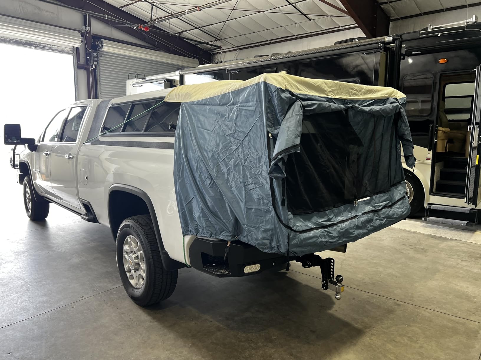 DAC Full-Size Truck Bed Tent for Caps - Fits Ford F-150, Chevy Silverado, Toyota Tundra, Tacoma (2005+), Tailgate >= 58″ – Converts Truck with Cap into Camping Tent customer photo 2″ class=”wp-image-customer”/></figure>


<h3>Who should buy this tent</h3>

<p>The DAC is the best truck bed tent for campers who already have a truck cap or topper installed and want the fastest, lightest possible camping solution. If you want to convert your capped truck bed into a sleeping area without removing the cap, this is the only purpose-built option worth considering. It is also ideal for hunters and anglers who want a quick shelter they can deploy and pack up in minutes.</p>

<h3>Who should look elsewhere</h3>

<p>If your truck does not have a cap, this tent will not work at all. Campers who need full waterproof protection should look at dedicated truck bed tents with higher waterproof ratings. The price point is also relatively high for a cap accessory, which might not make sense if you only camp occasionally.</p>

<div class=