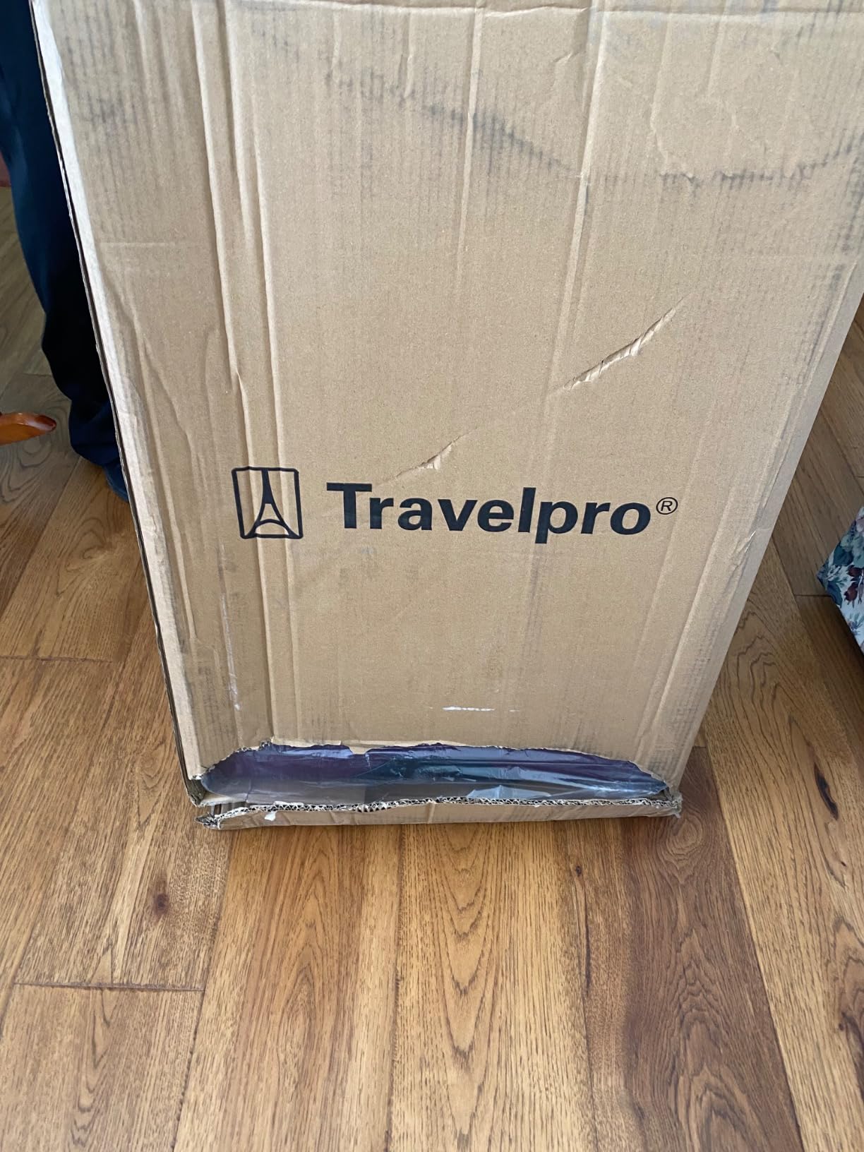 Travelpro Tourlite Softside 21-Inch Expandable Luggage with 4 Spinner Wheels, Lightweight Suitcase, Carry-On, Deep Purple customer photo 1