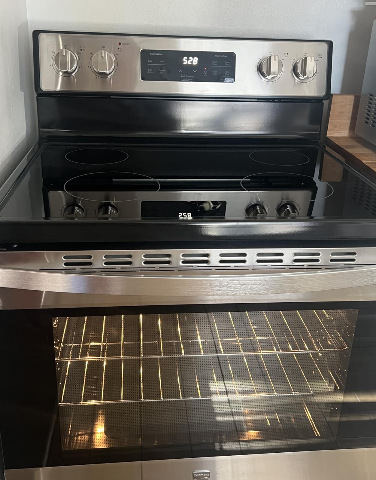 5.2 cu ft. Rear Control Electric Range - 4 Cooktop Elements - Steam Clean Oven & Hidden Bake for Easy Cleaning - Ultra-Durable Chrome Racks & Storage Drawer - Black customer photo 2