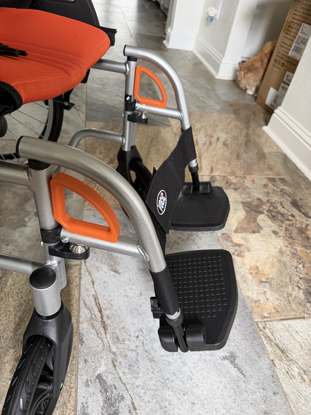 VOCIC Ultra Lightweight Wheelchair for Adults, 23lb Frame Portable Foldable Self-Propelled Wheelchairs for Seniors with Quick Release Wheels, Swing-Away Footrests,Flip-Back Arm, 300 lbs Orange customer photo 1