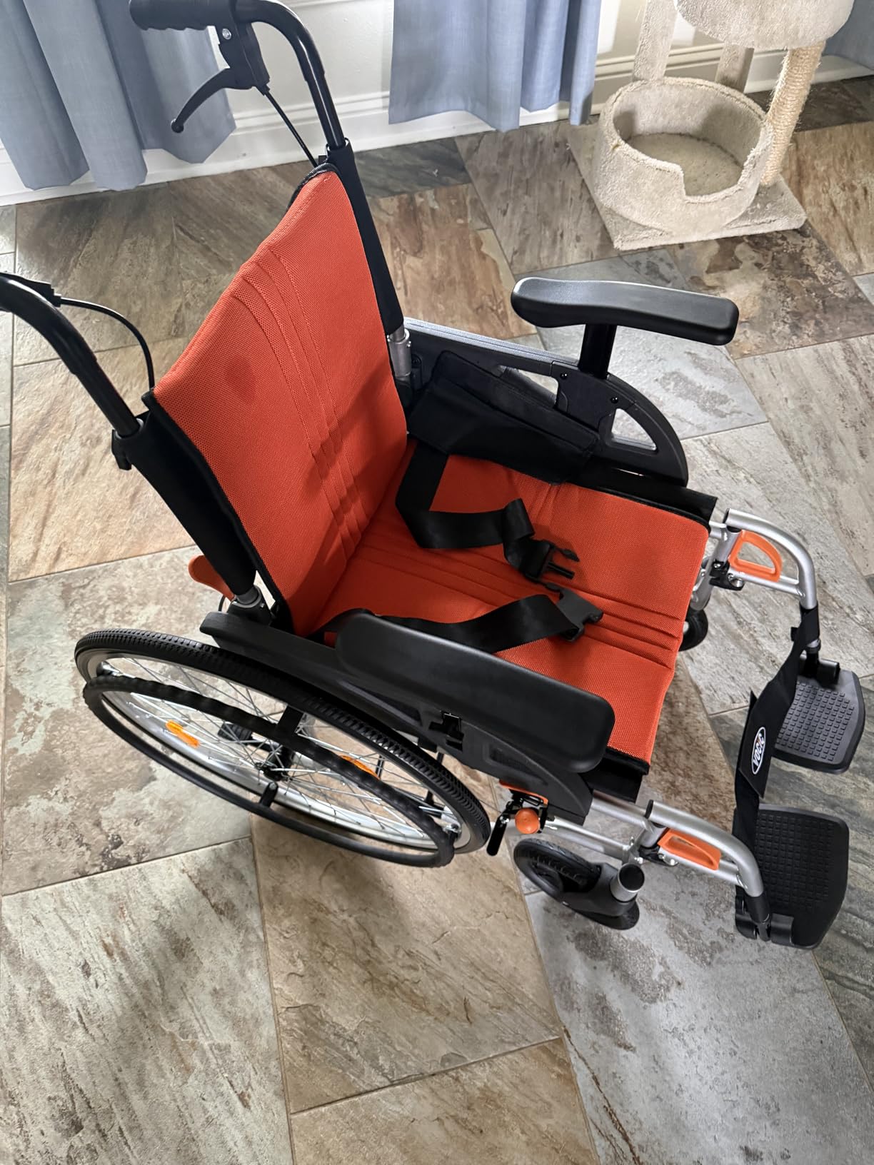 VOCIC Ultra Lightweight Wheelchair for Adults, 23lb Frame Portable Foldable Self-Propelled Wheelchairs for Seniors with Quick Release Wheels, Swing-Away Footrests,Flip-Back Arm, 300 lbs Orange customer photo 2