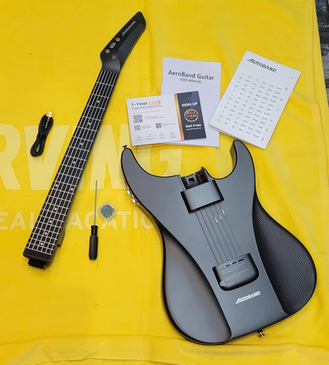 AeroBand Guitar Smart Guitar With Silicone Strings, Travel Silent Guitar With Detachable Fretboard, Headphone Jack, Built-in Speaker and Drum system, Aeroband APP Play, MIDI customer photo 1